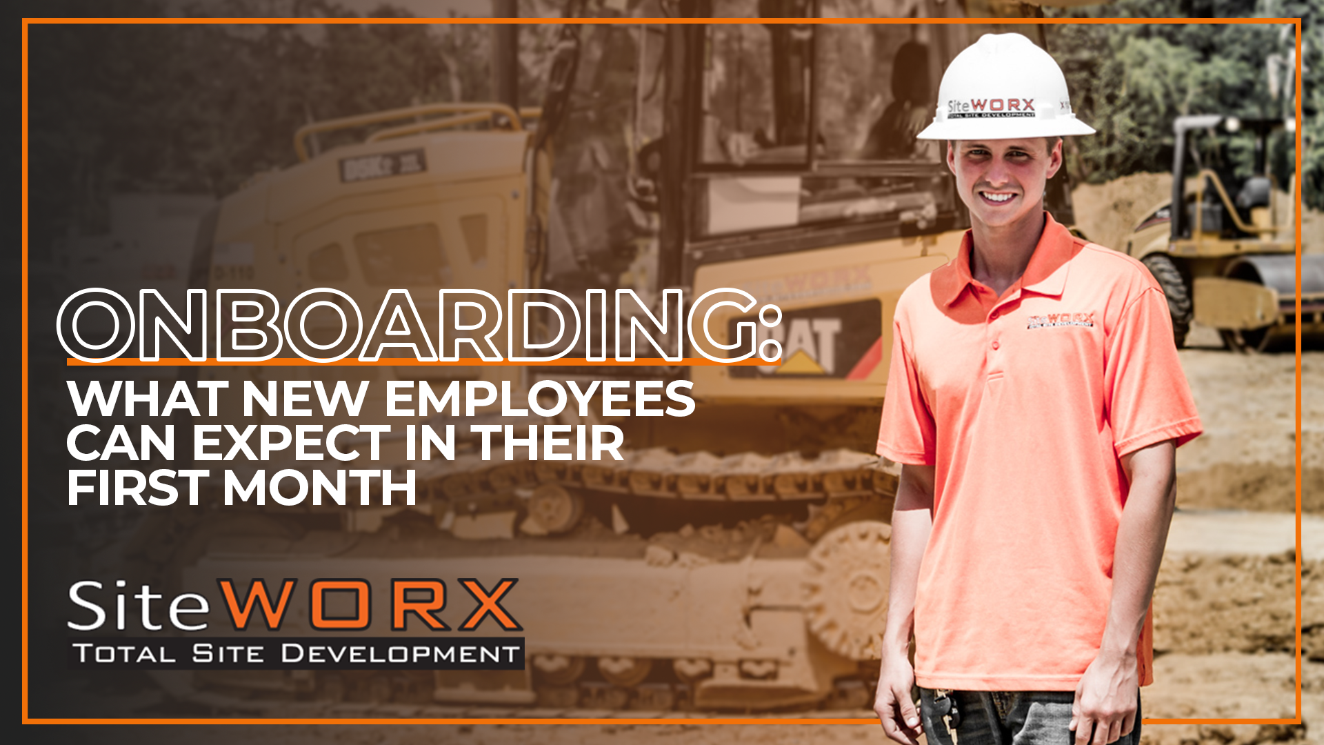 Construction worker standing in front of equipment on job site